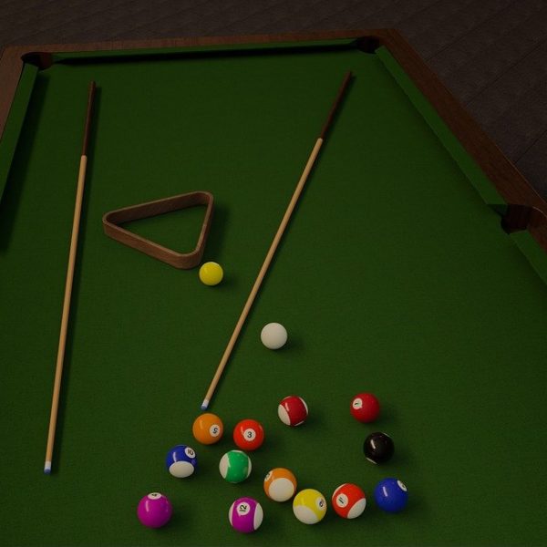 billiard balls with pool stick and triangle